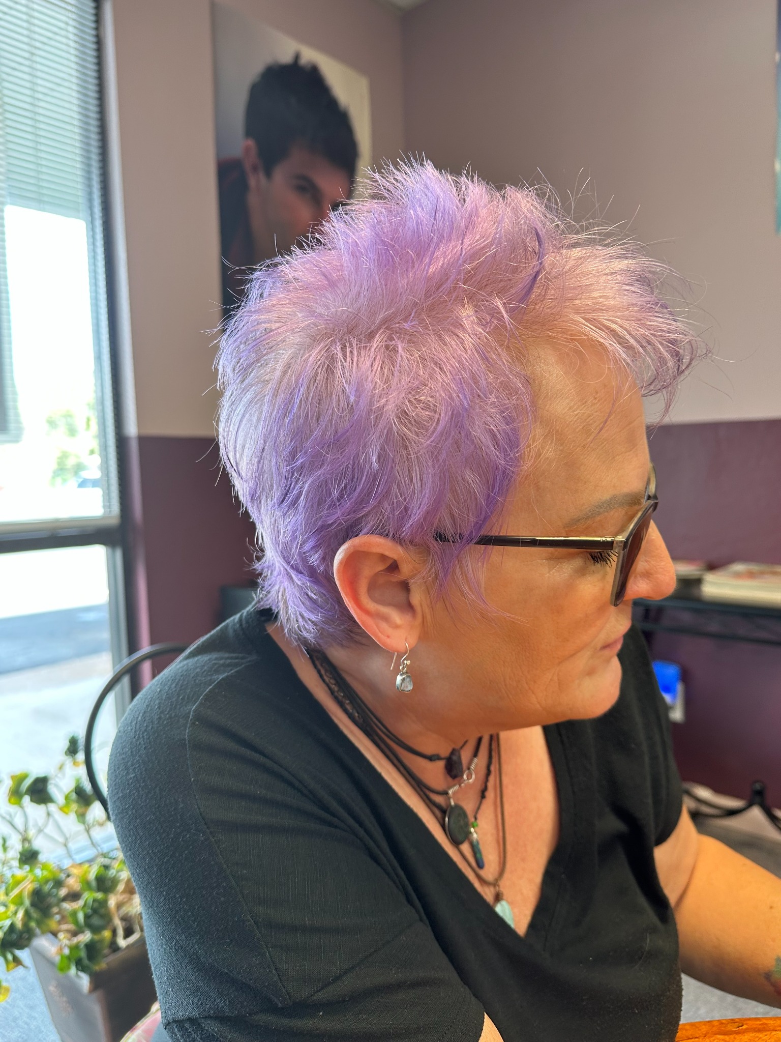 Lavender pixie haircut shown from the side
